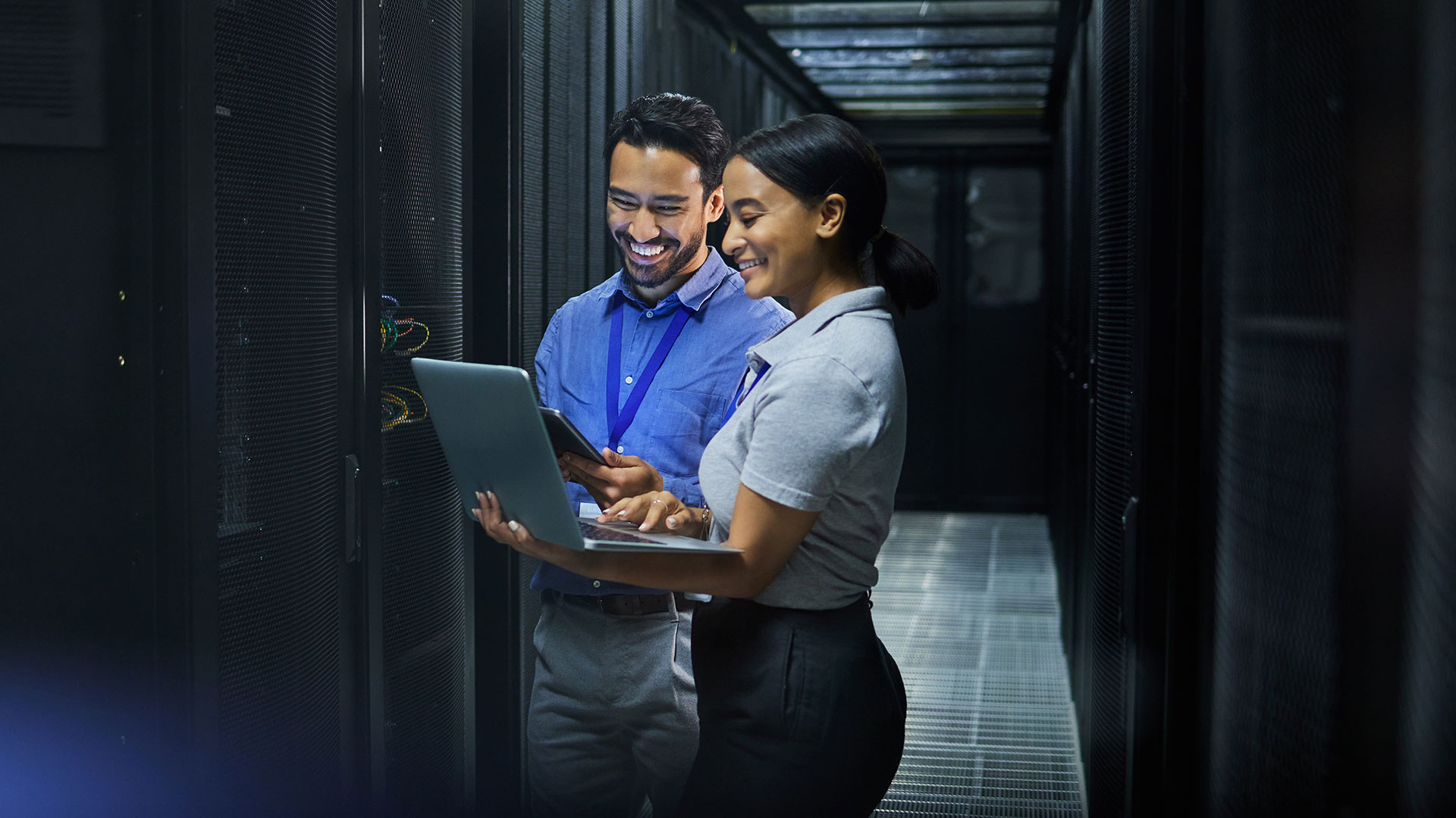 Employees in a server room