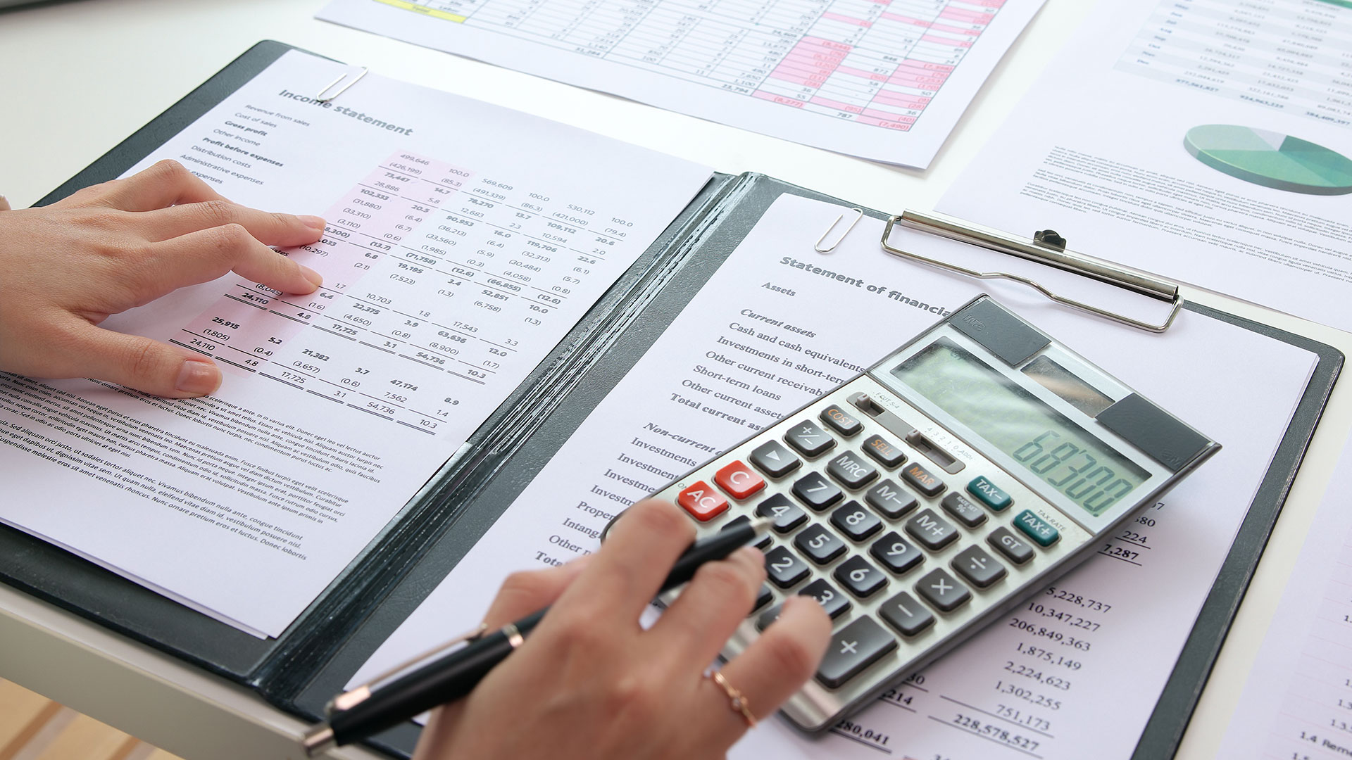 Worker using a calculator