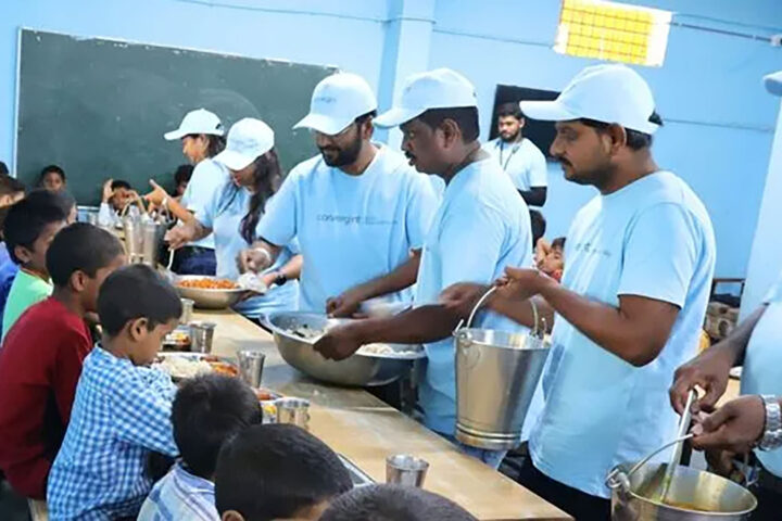 Convergint’s India team feeding children at school