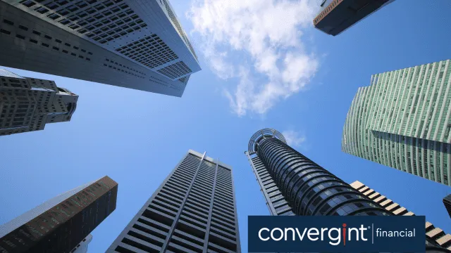 View of high-rise buildings and blue sky from the ground
