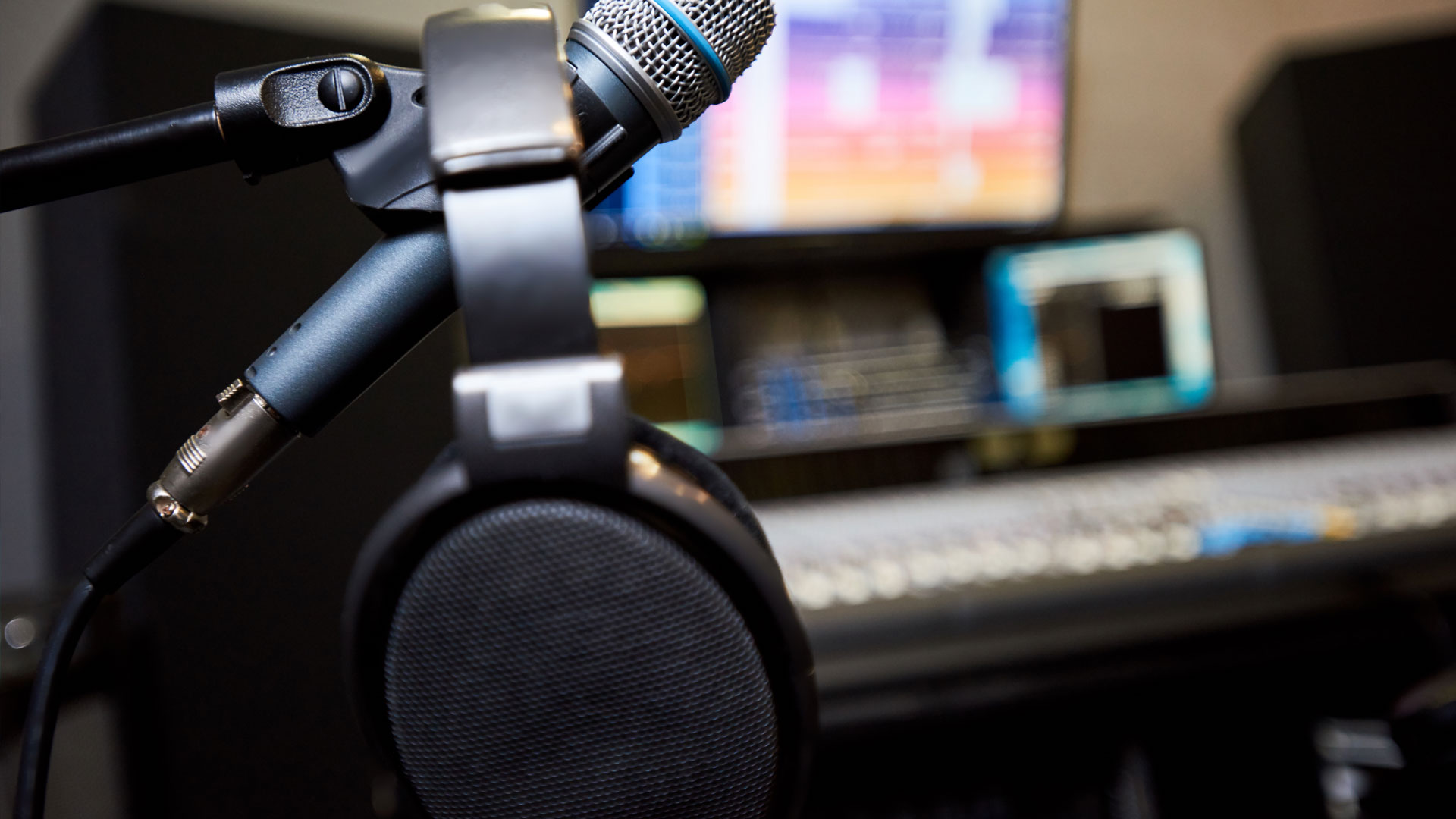 Microphone and headphones in studio